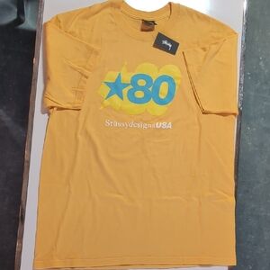Stussy Yellow and Blue Star Graphic Tee